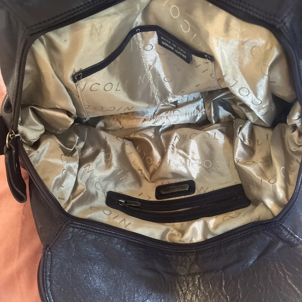 Nicoli Italian leather Large satchel features a dark purplish Blue finish